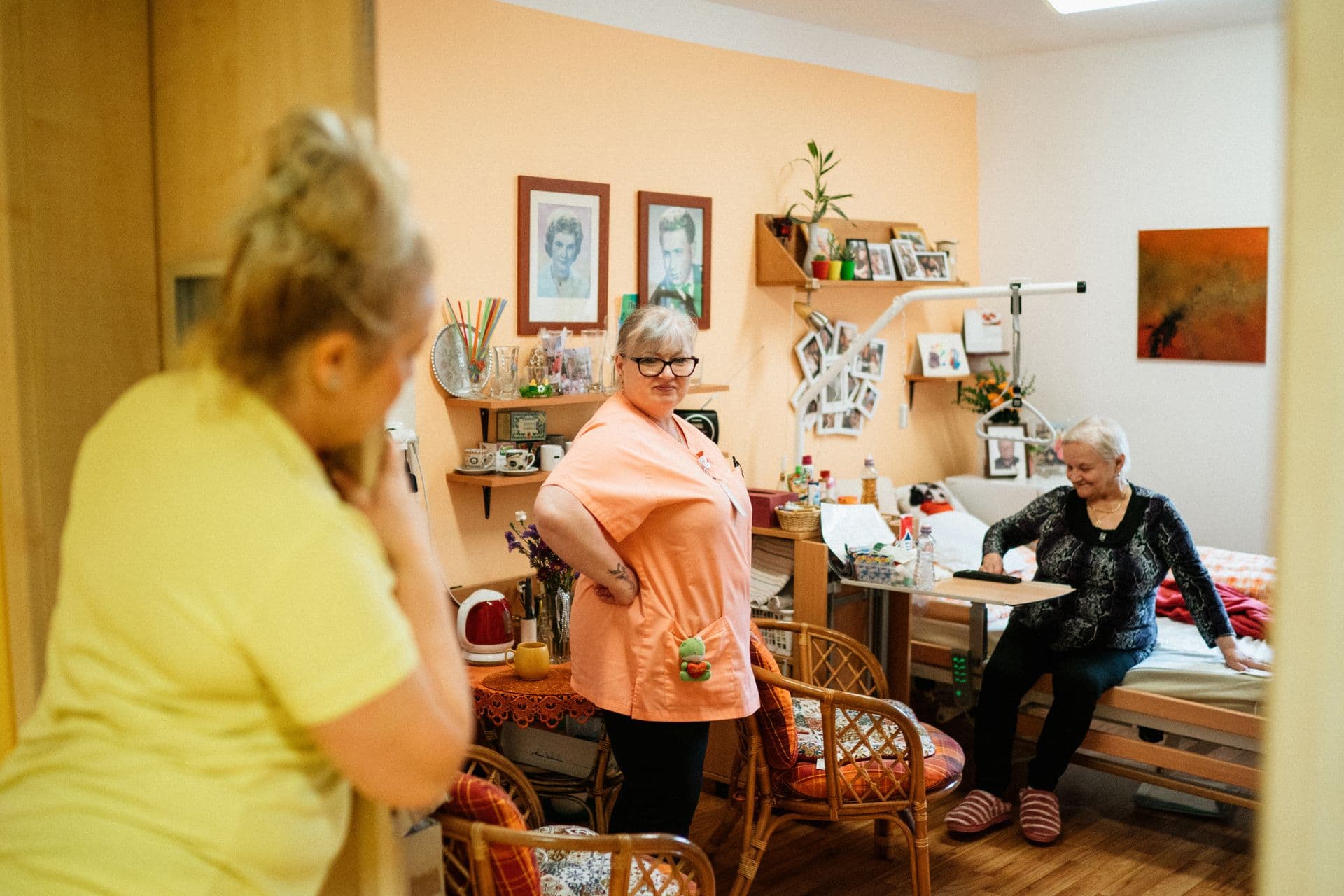 Crossways carers spending time with a client in her home